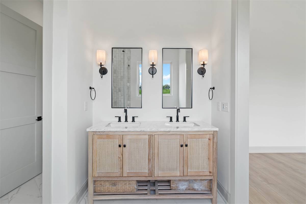 Sleek Double Vanity and Mirrors in Master Bathroom