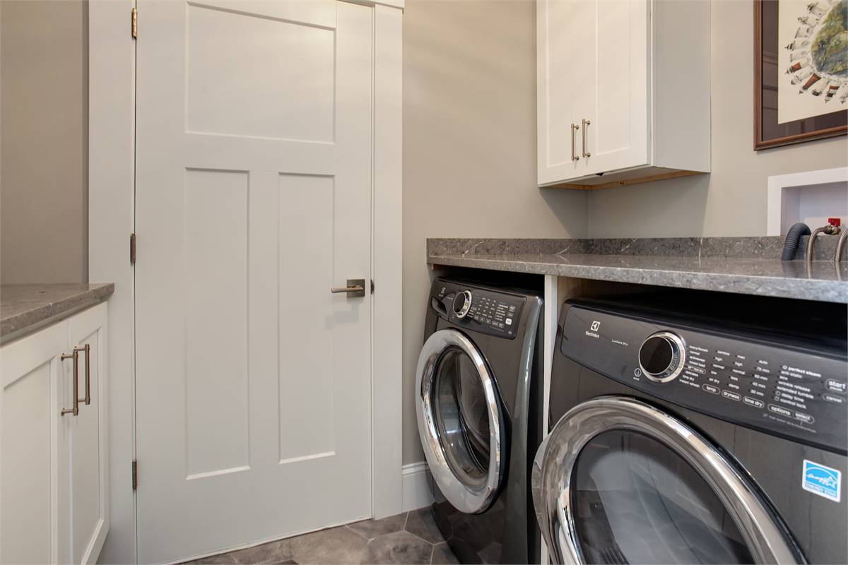 Clean and Bright Laundry Room image of Bonaire House Plan