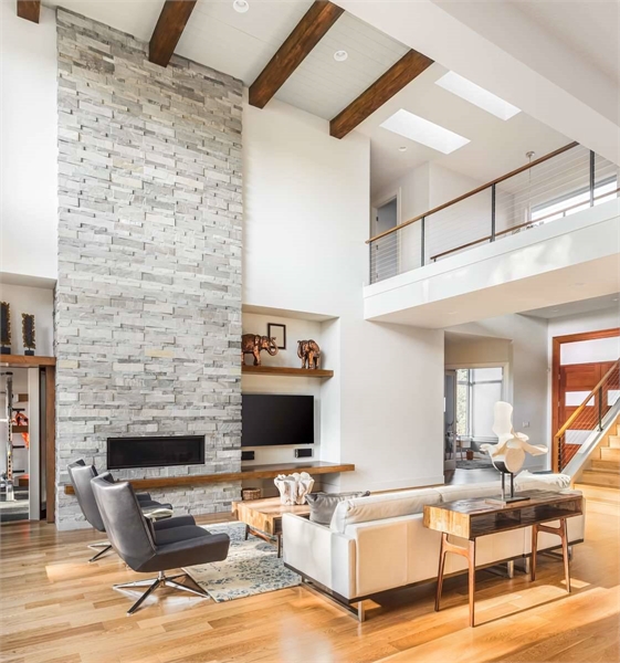 Incredible Great Room Featuring High Ceilings and Fireplace