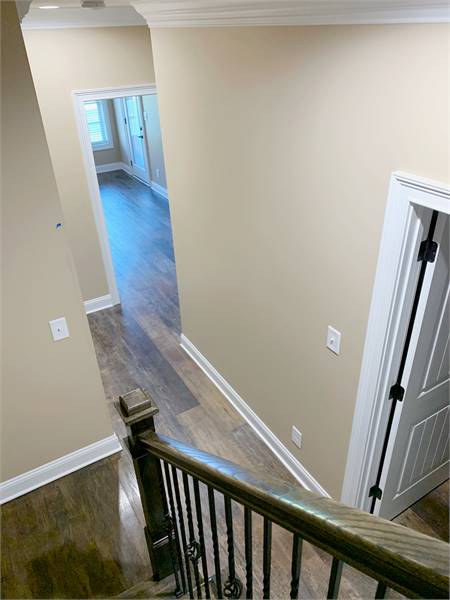 Staircase To Bonus Room image of The Oak Lane House Plan