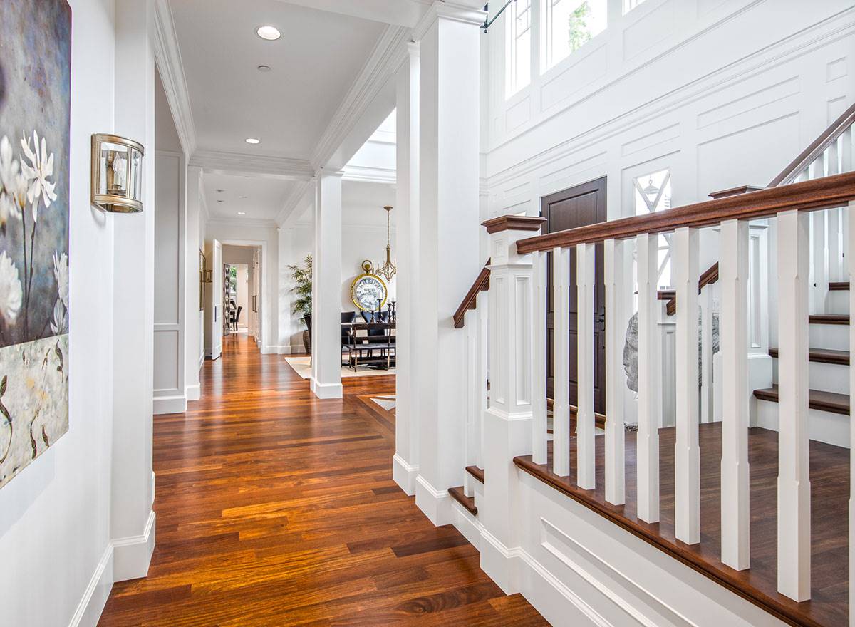 Two Story Foyer and Hallway Spanning Width of Main Floor