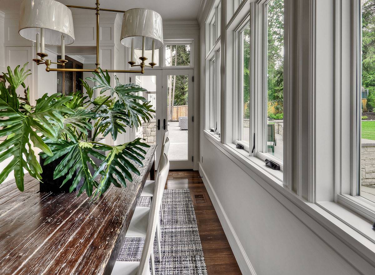 Breakfast Nook Surrounded by Windows for Light and Openness