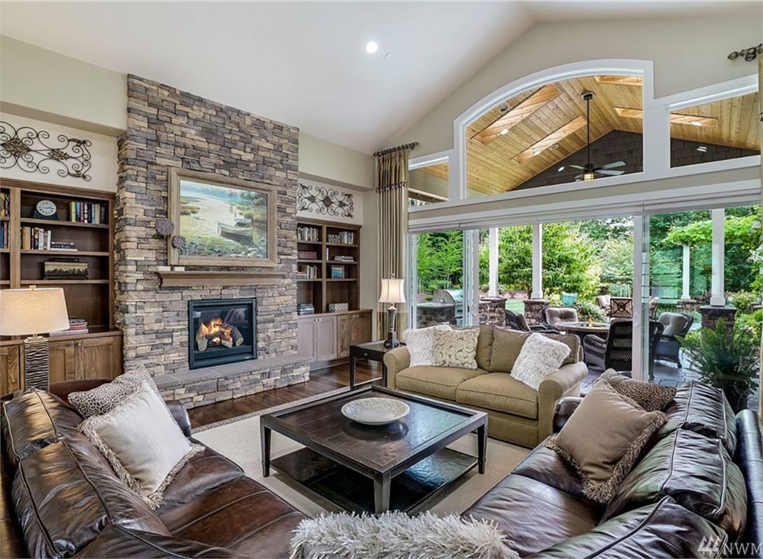 Vaulted Great Room with Stone Fireplace & Built-Ins