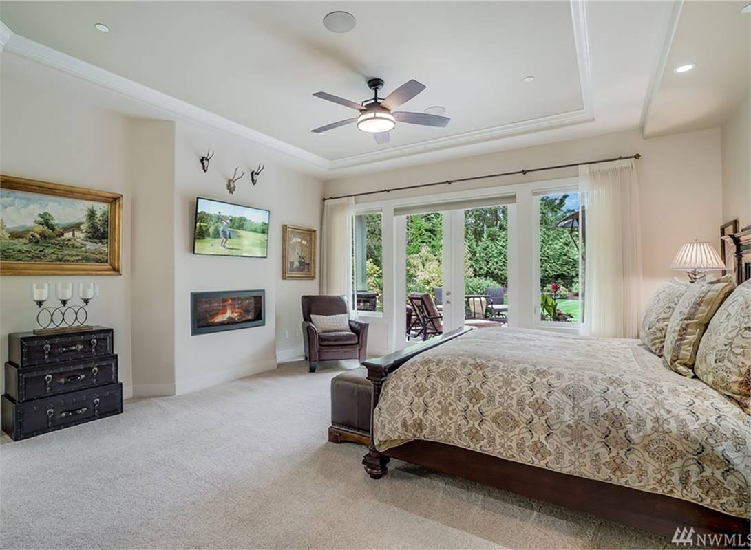 Beautiful Master Bedroom with Tray Ceiling and French Doors