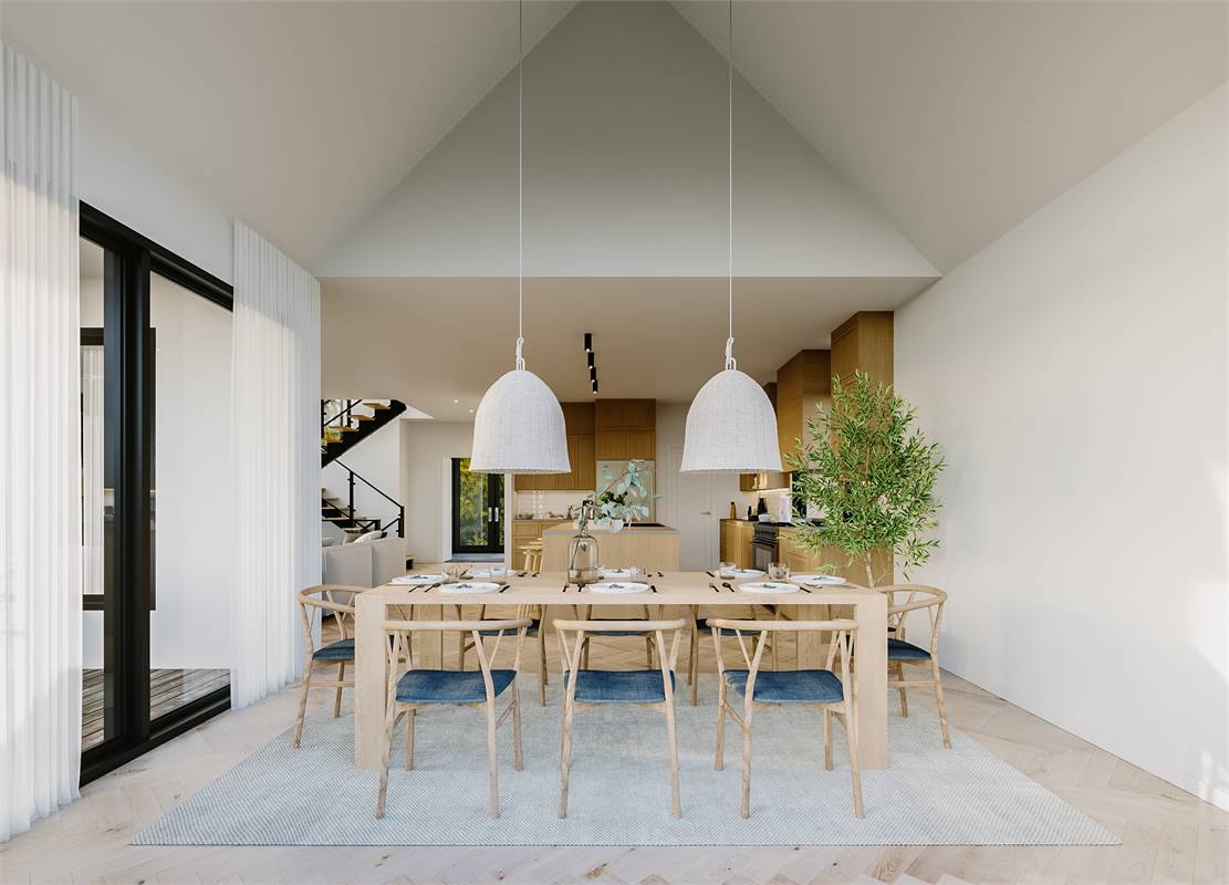 Gorgeous Dining Room with Vaulted Ceiling and Natural Light