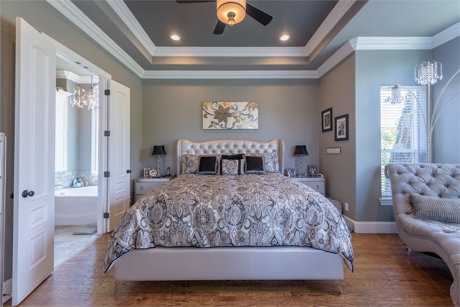 Master Bedroom Featuring Tray Ceiling and Ensuite Bathroom image of Vita Encantata House Plan