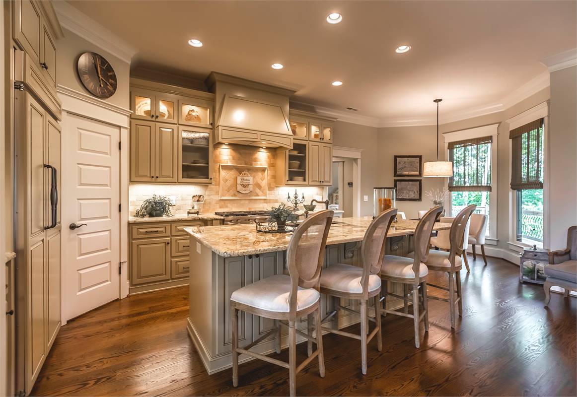 The Kitchen Features a Large Walk-In Pantry image of Reconnaissante Cottage House Plan