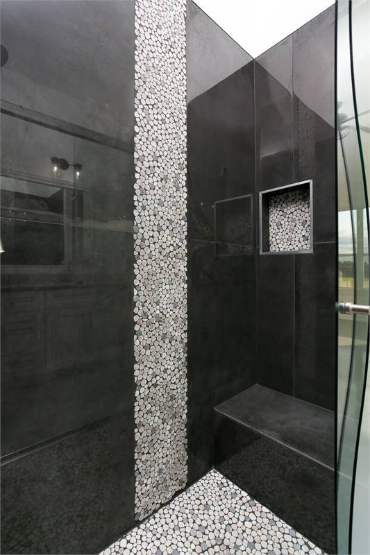 Extraordinary Shower Tile with Waterfall Detail and Niche image of High Meadow Cabin House Plan
