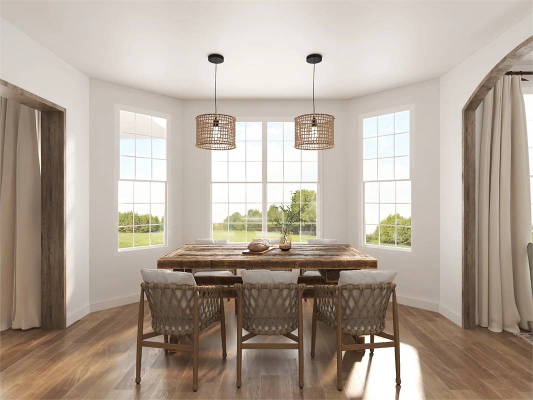 Luxurious Dining Room Featuring Triple Windows with Mullions
