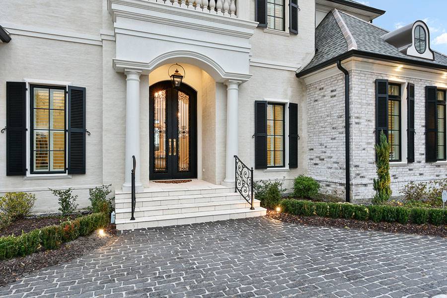 Front Entry Showcasing Walkway with Classic Brick Pavers