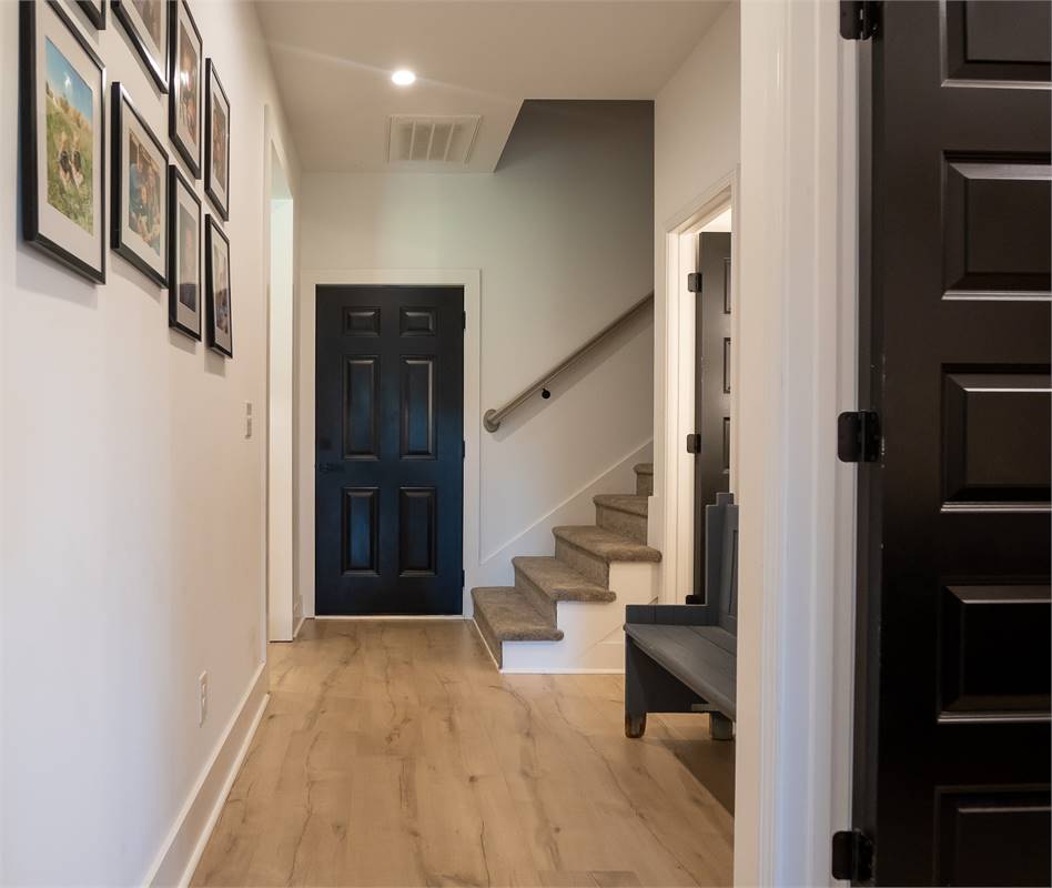 Hallway and Stairs Leading to Bonus Room image of Chelci House Plan