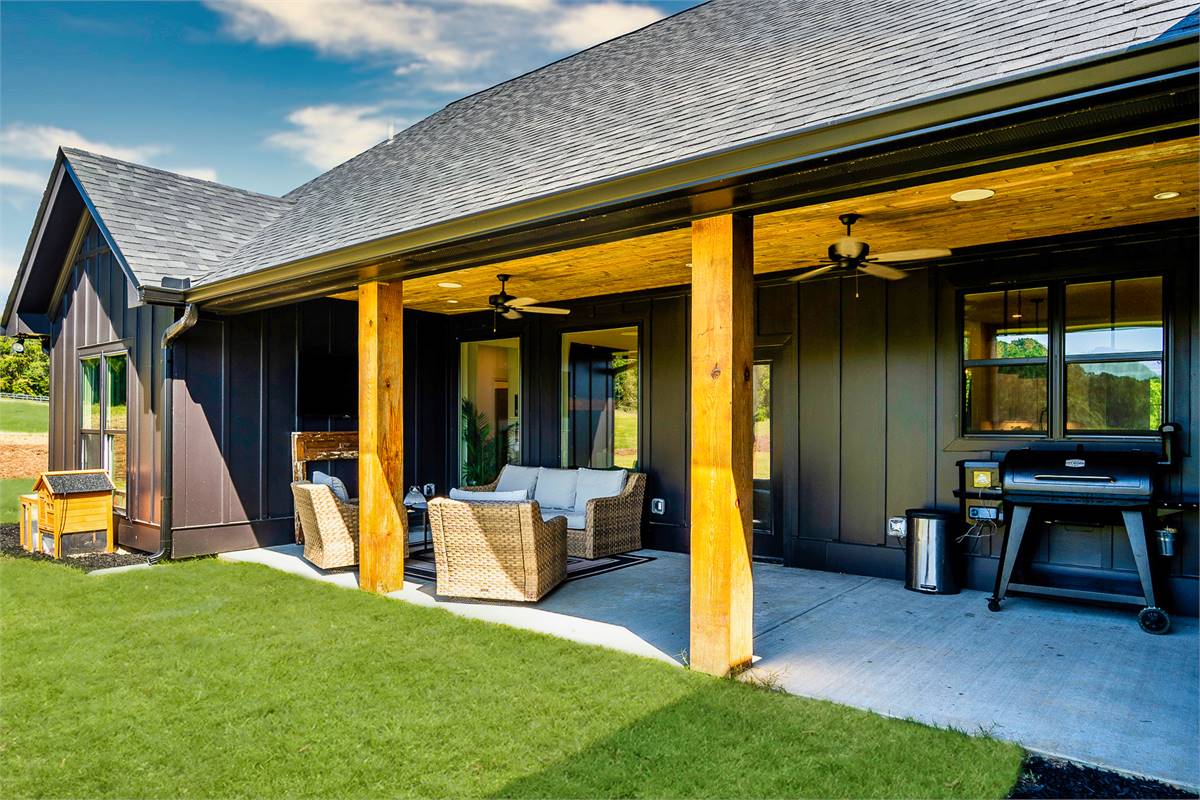 Rear View Featuring Cozy Outdoor Living Space