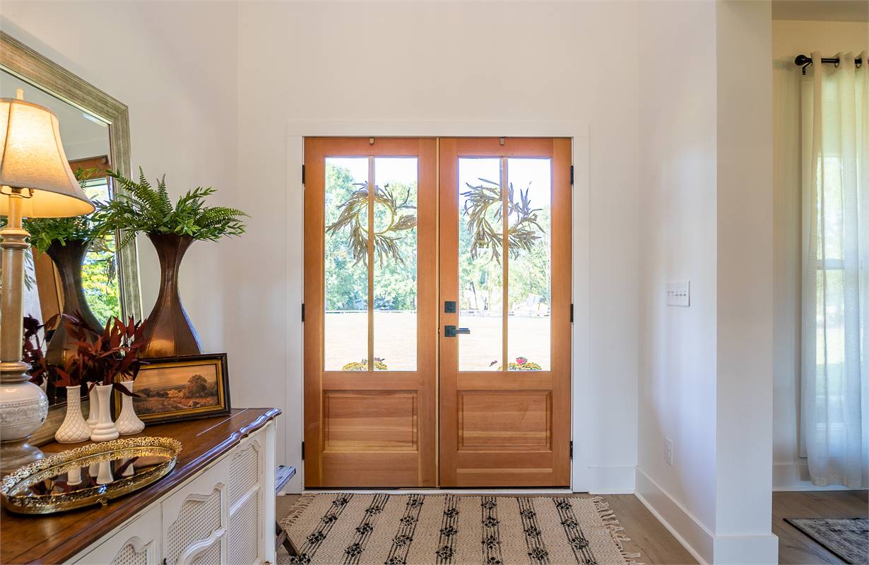 Customer's Custom Front Door and Foyer Area image of Walden House Plan