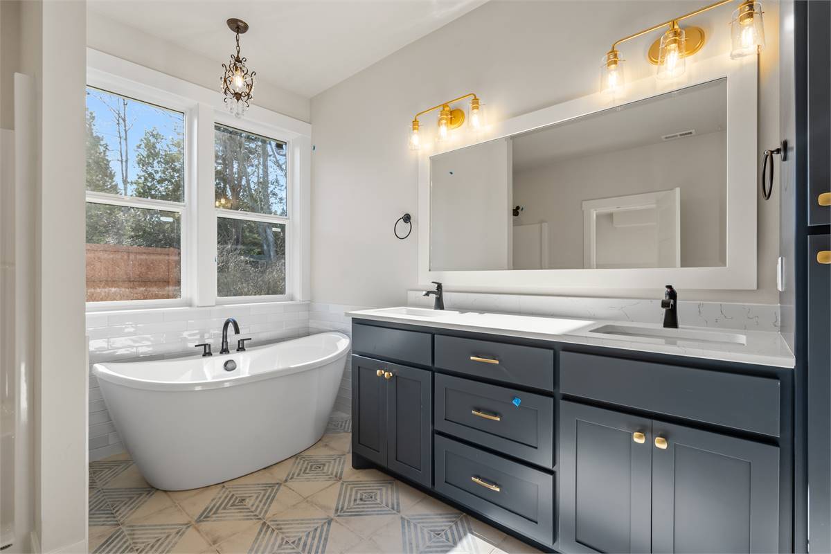 Master Ensuite Bathroom with Double Vanity and Soaking Tub