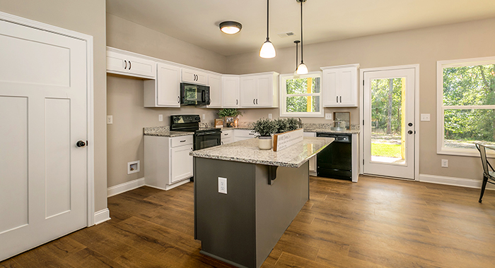 Chef Inspired Kitchen with Large Island and Bright Finishess image of SUTHERLIN House Plan