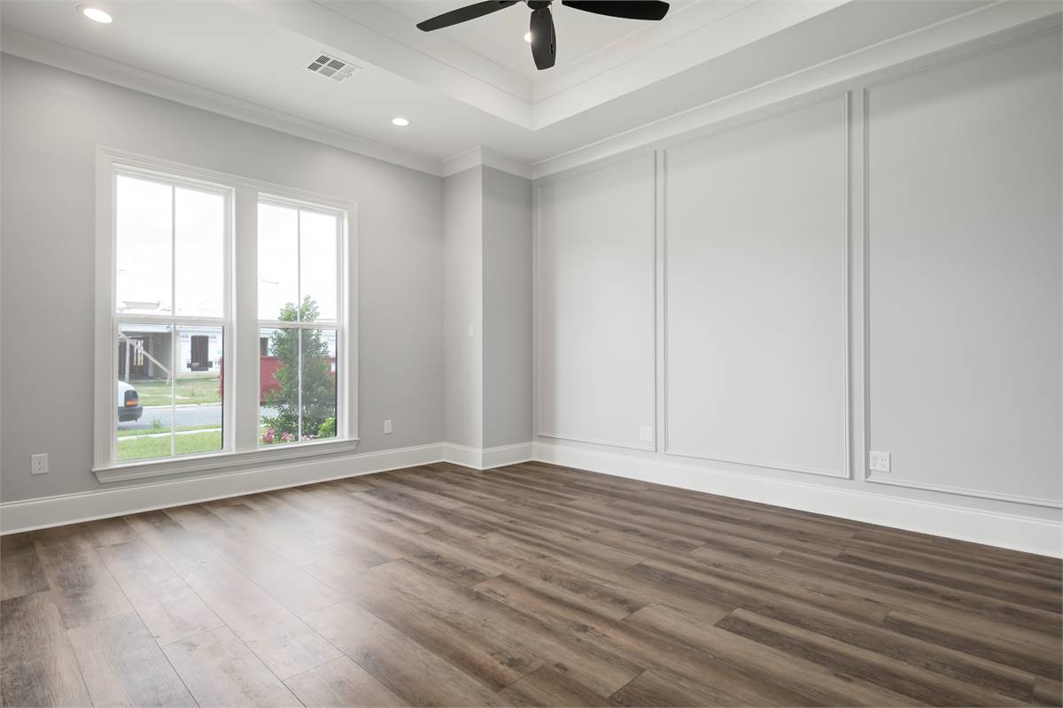 Spacious Master Bedroom with Tray Ceilings
