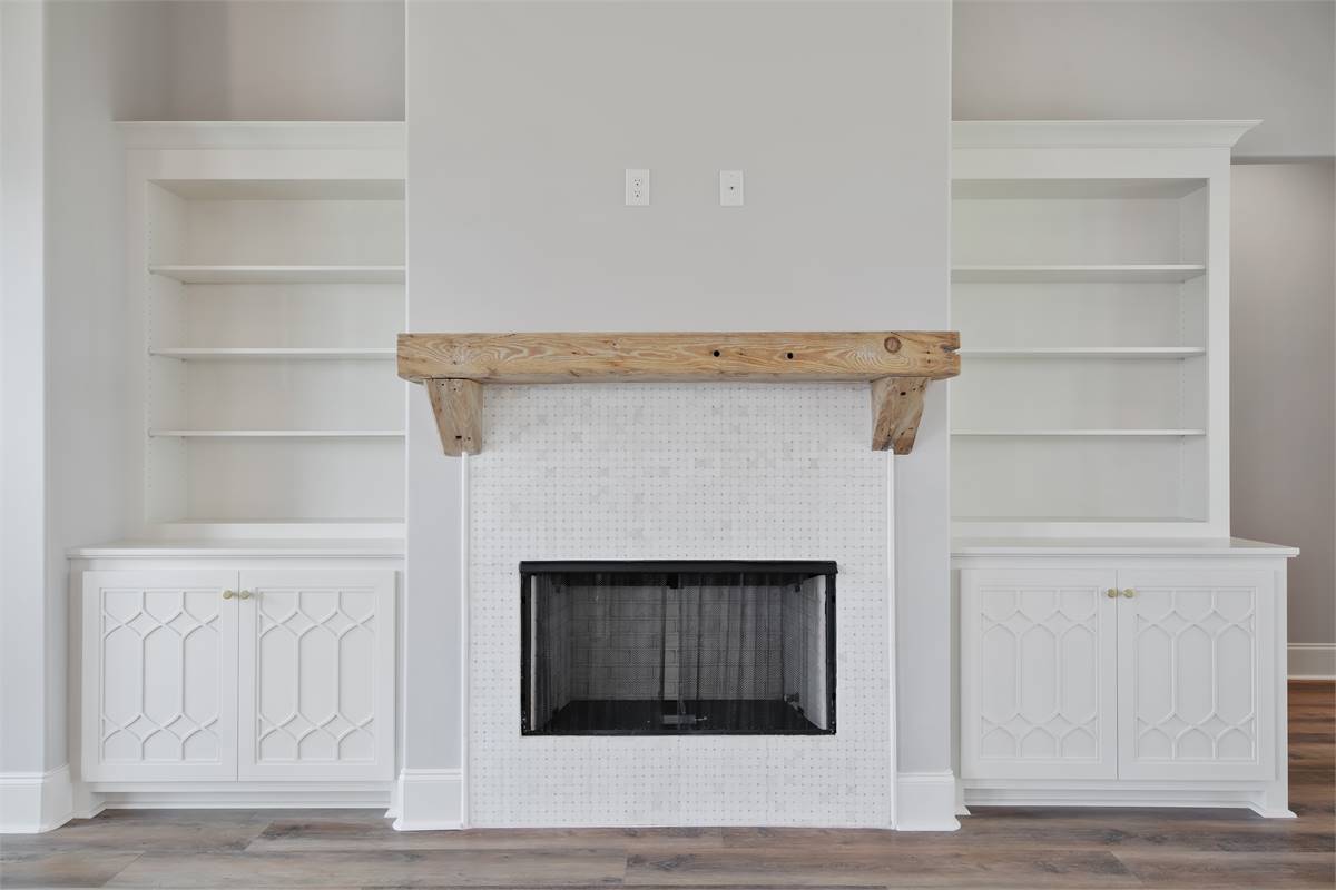 White Tiled Fireplace with Built-ins
