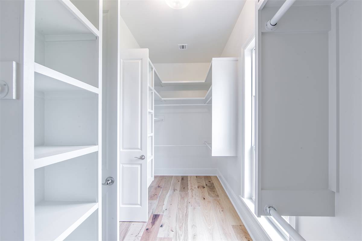 Large Walk-in Closet with Shelving image of Wildwood House Plan