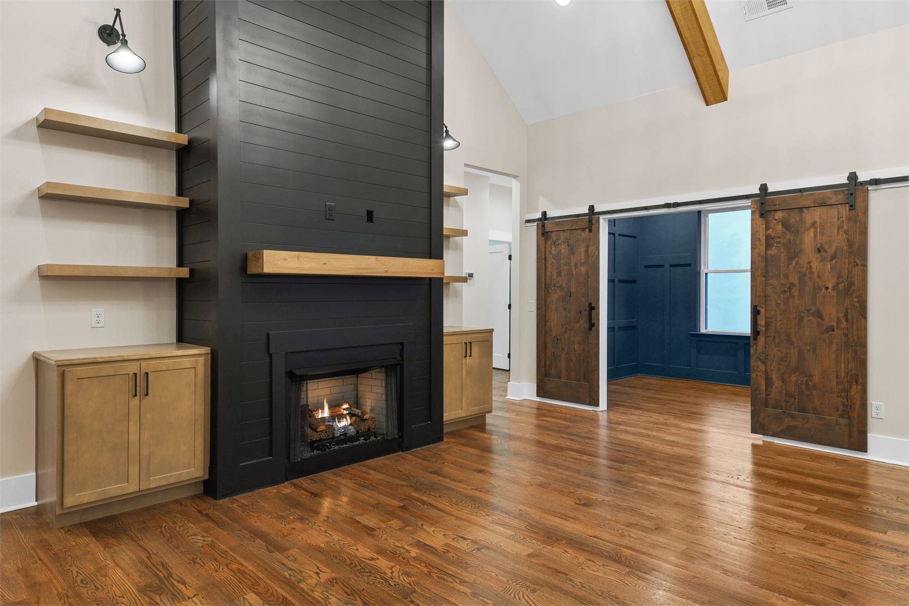 Client Built Fireplace with Built-ins image of Black Creek House Plan