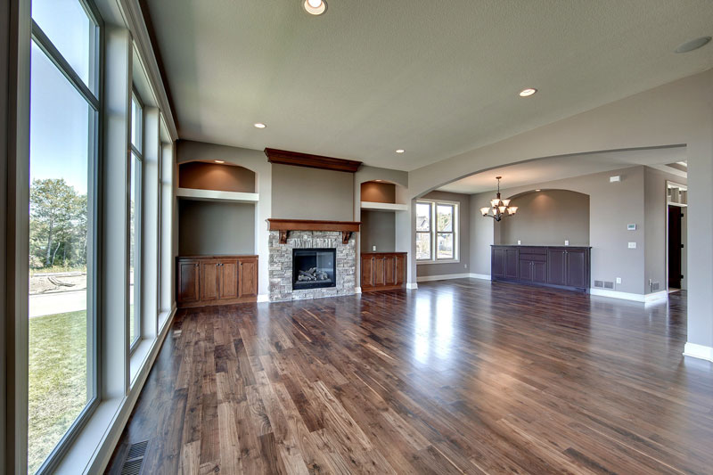 Great Room image of 3-Story Craftsman with Sport Court House Plan