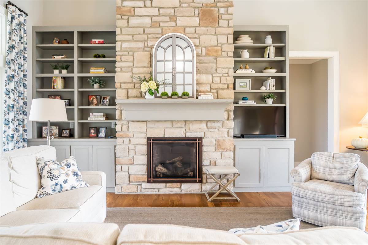 Stone Fireplace with Built-ins to Maximize Storage Space