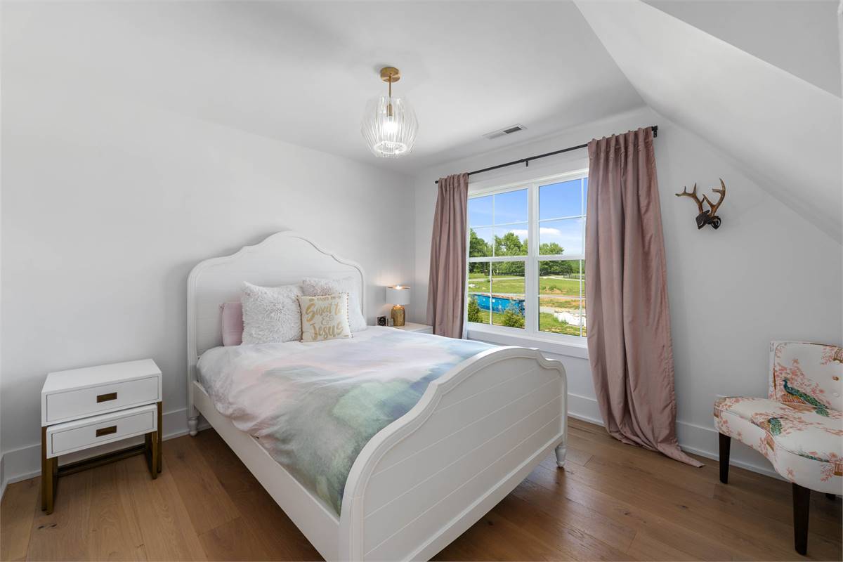 Bright Secondary Bedroom with Large Window