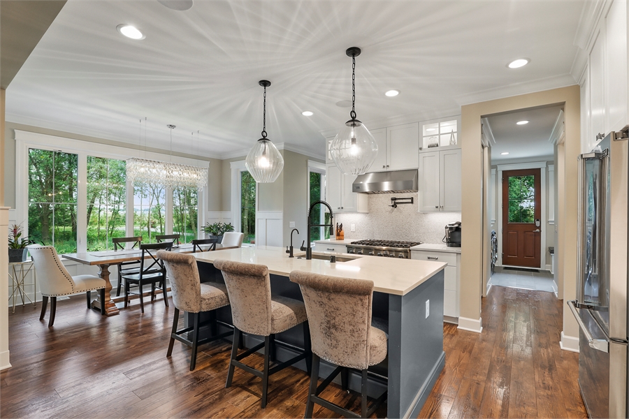 Light Filled Kitchen with Large Eating Island image of Green Acres House Plan
