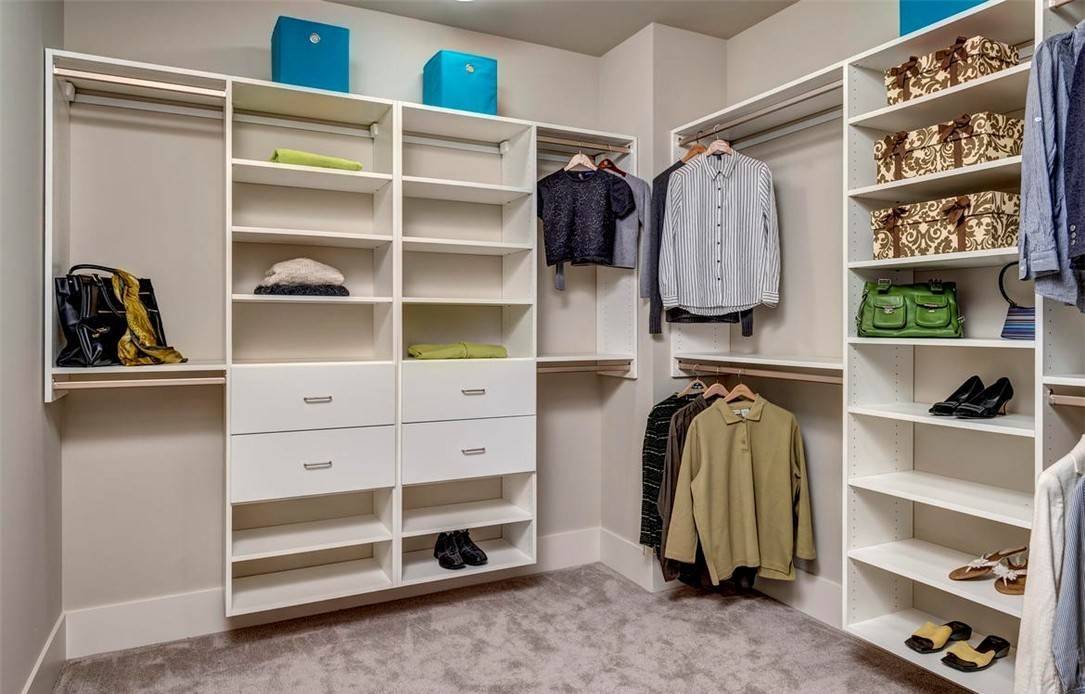 Outstanding Master Closet with Custom Shelving