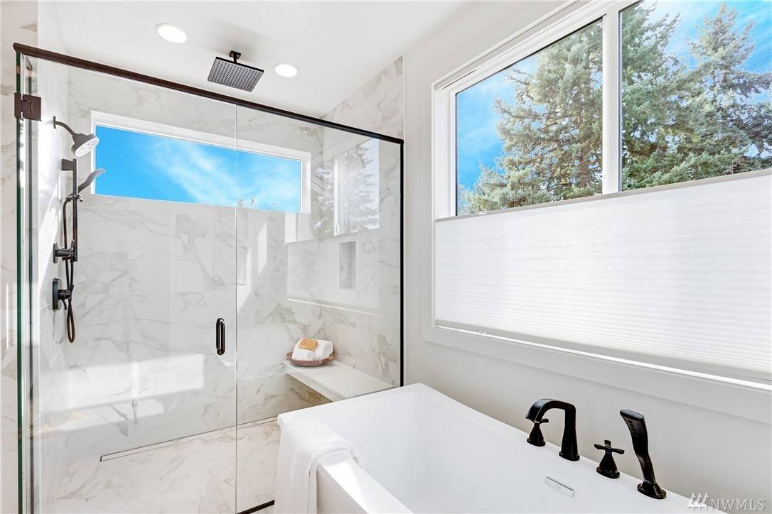 Spa-like Glass Shower and Soaking Tub in Master bath