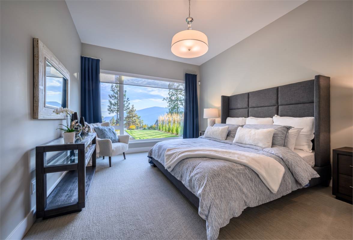 Expansive Window Adds Natural Light in Master Bedroom